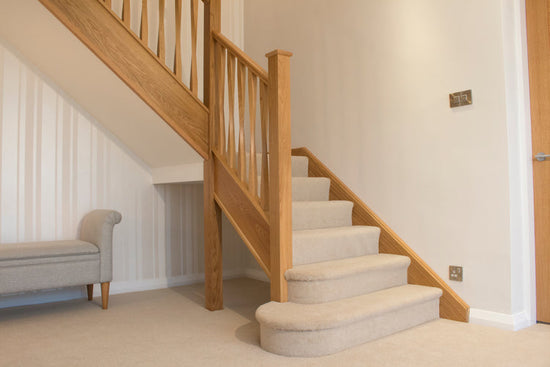 Should I choose wooden or carpeted stairs?